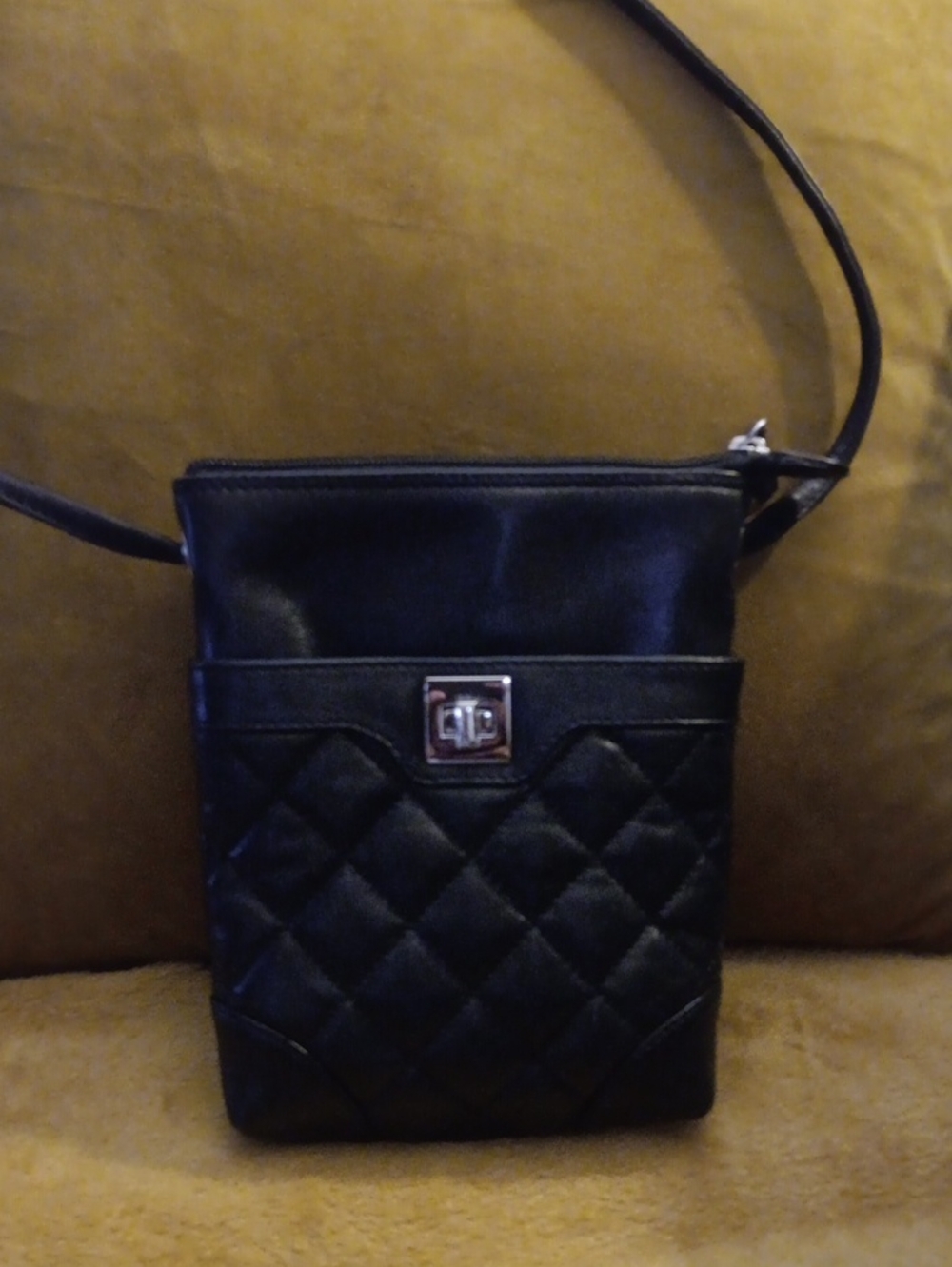 Black Quilted Crossbody Bag with Turn-Lock Closure***